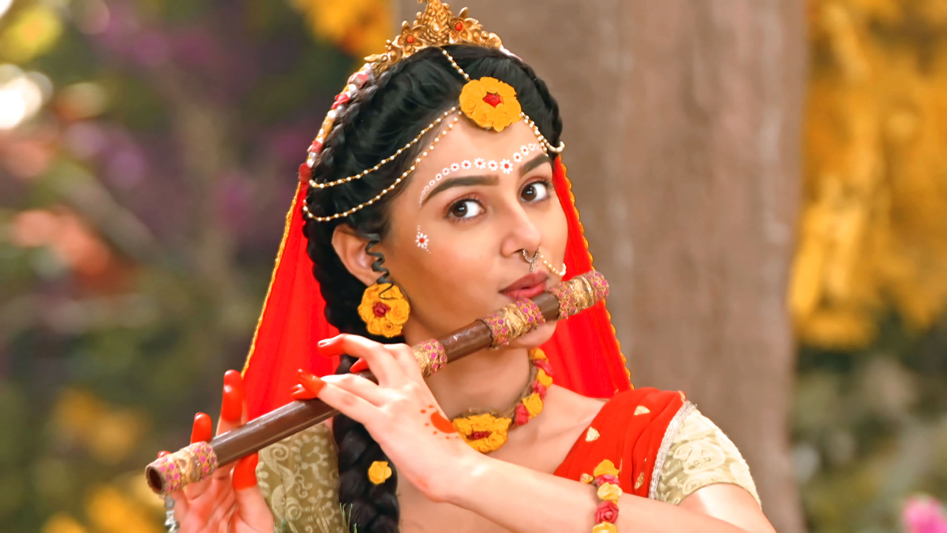 Radha Plays Krishna's Flute